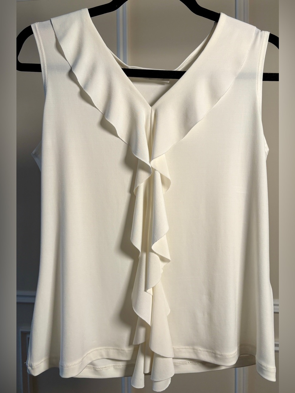 Sleeveless Ruffle V-Neck Camisole in Ivory with a Cascading Ruffle